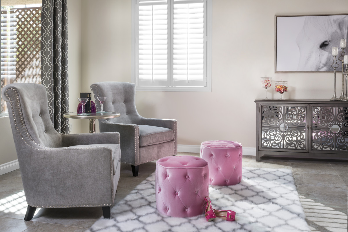Southern California pink living room with shutters